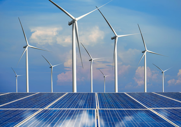 Solar energy panel photovoltaic cell and wind turbine farm power generator in nature landscape for production of renewable green energy is friendly industry. Clean sustainable development concept.