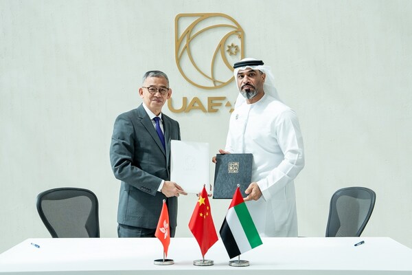 ICAC Commissoner (left) and Chairman of UAE Accountability Authority, H.E. Humaid Obaid Abushibs, sign a Memorandum of Understanding.