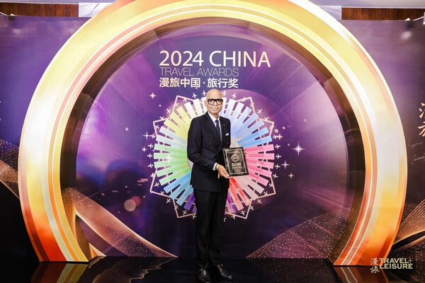Mr. Stuart-Wayne Douglas receiving accolades from Travel + Leisure China award ceremony