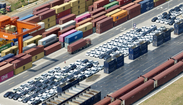 New energy vehicles awaiting export shipment at the Paihe Port railway logistics base in Hefei, east China's Anhui Province, June 17, 2025 (aerial drone photo). (Xinhua/Zhou Mu)